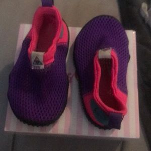 Little girls Nike shoes.